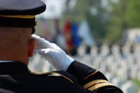 Air Force officer saluting with back to camera