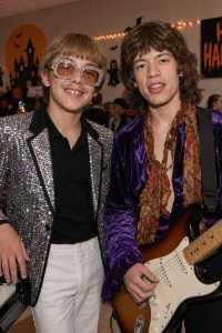 Boys dressed as Elton John & Mick Jagger at a Halloween Party